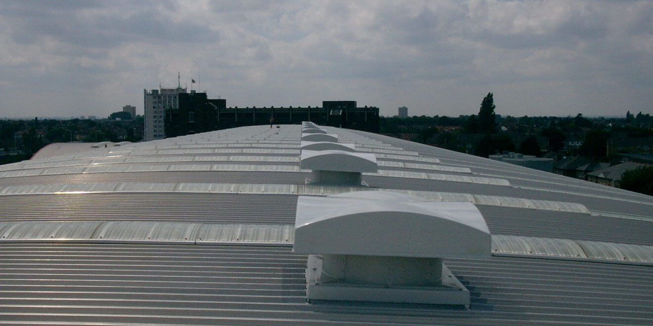 weathertight roof upstands and access hatches shown on top of a building